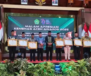 Pj Bupati Aceh Jaya Terima Penghargaan Awards PPG dan PAI Kemenag RI Tahun 2025