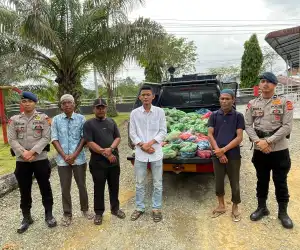 Batalyon C Pelopor Brimob Polda Aceh Bagikan 440 Paket Daging Qurban