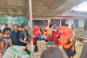 Pemuda Pancasila Nagan Raya Bantu Kebutuhan Warga yang Terdampak Banjir